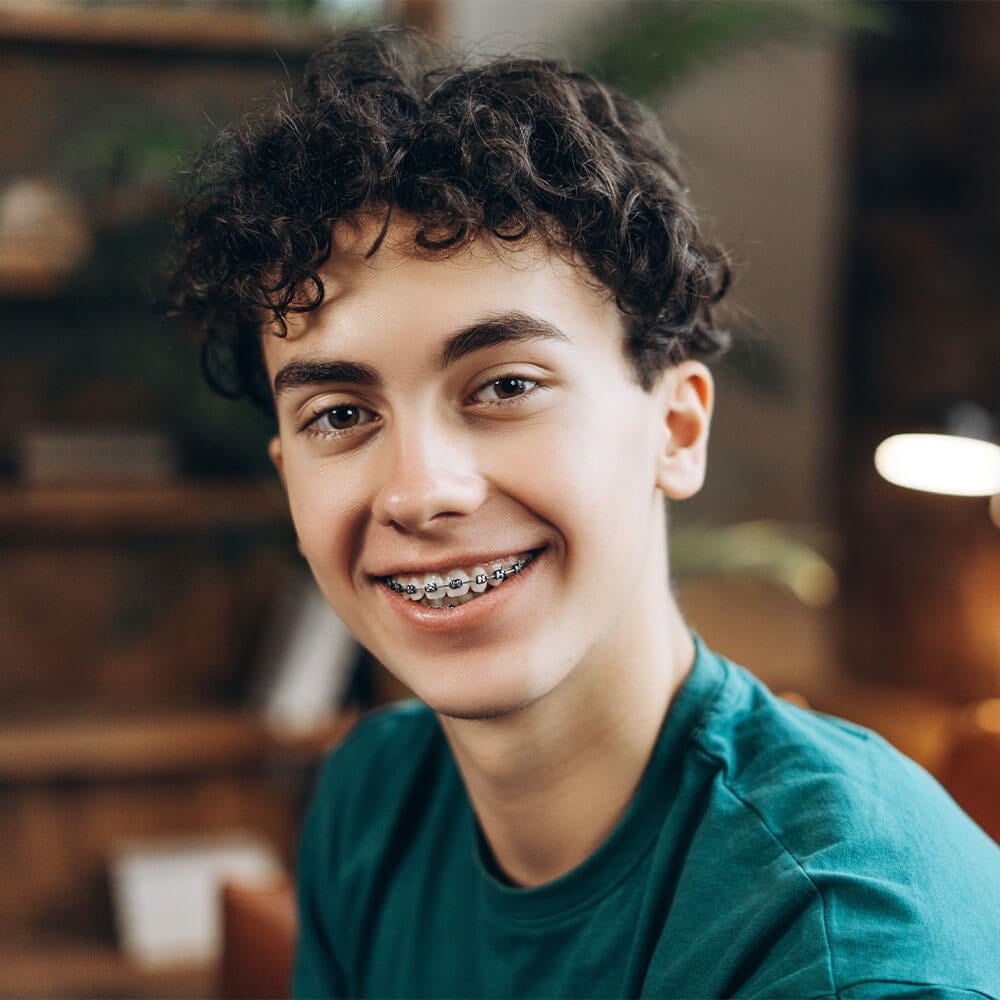Teenager smiling with braces