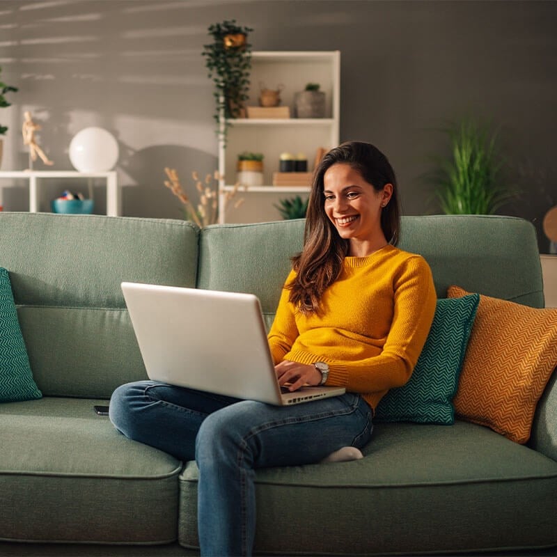 Woman on computer filling out online forms